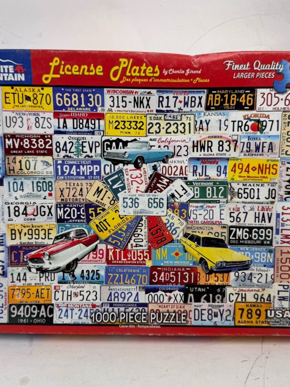 White Mountain License Plates 1000 Piece Jigsaw Puzzle Charlie Girard 24x30 961C